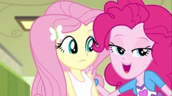Size: 1100x618 | Tagged: safe, screencap, fluttershy, pinkie pie, equestria girls, friendship games, clothes, lidded eyes, tanktop