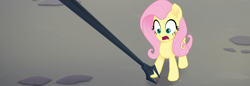 Size: 1360x467 | Tagged: safe, screencap, fluttershy, pegasus, pony, my little pony: the movie, bident, cropped, female, mare, official, solo, spear, weapon, you know for kids