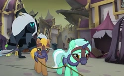 Size: 845x521 | Tagged: safe, screencap, lyra heartstrings, my little pony: the movie, background pony, bound together, canterlot, collar, cropped, harness, horn cap, magic suppression, muzzle, ruins, sad, slavery, storm guard, tack