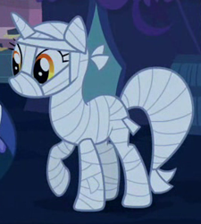 Size: 270x300 | Tagged: safe, screencap, lyra heartstrings, pony, unicorn, luna eclipsed, clothes, costume, cropped, female, mare, mummy, mummy costume, nightmare night costume, outfit catalog, raised hoof, solo