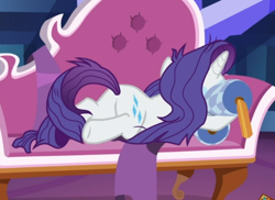 Size: 676x492 | Tagged: safe, screencap, rarity, pony, unicorn, dragon dropped, cropped, fainting couch, female, holding, lying down, mare, marshmelodrama, messy mane, pillow, rarity being rarity, solo