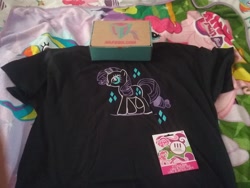 Size: 2592x1944 | Tagged: safe, pinkie pie, rarity, pony, unicorn, bed, blanket, box, clothes, cutie mark, diamonds, mlp box, shirt, sticker