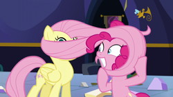 Size: 1280x720 | Tagged: safe, screencap, fluttershy, pinkie pie, pegasus, pony, party pooped, hair pulling, twilight's castle
