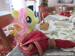 Size: 1555x1166 | Tagged: safe, artist:cuddlesaurus21, fluttershy, pegasus, pony, caramel apple (food), dining table, irl, napkin, photo, plate, plushie, sitting, smiling, solo