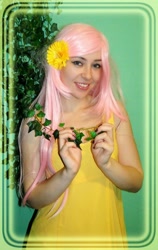 Size: 710x1126 | Tagged: safe, artist:restlessmuse, fluttershy, human, clothes, cosplay, costume, flower, flower in hair, irl, irl human, photo, solo