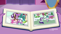 Size: 711x400 | Tagged: safe, screencap, rarity, spike, dragon, pony, unicorn, a-dressing memories, best gift ever, spoiler:a-dressing memories, spoiler:mlp friendship is forever, book, winter clothes