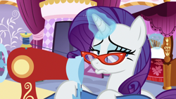 Size: 1920x1080 | Tagged: safe, screencap, rarity, pony, unicorn, dragon dropped, glasses, pouting, rarity's glasses, sewing machine, solo