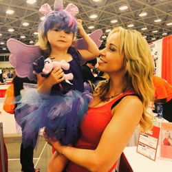 Size: 600x600 | Tagged: safe, derpibooru import, twilight sparkle, twilight sparkle (alicorn), alicorn, human, aurora, clothes, convention, cosplay, dallas comic con, irl, irl human, photo, plushie, tara strong, target demographic