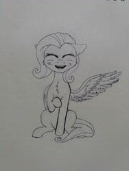 Size: 774x1032 | Tagged: safe, artist:ironbeastz, fluttershy, pegasus, pony, monochrome, one wing out, sitting, solo, traditional art