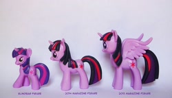 Size: 1600x918 | Tagged: safe, derpibooru import, twilight sparkle, twilight sparkle (alicorn), unicorn twilight, alicorn, pony, unicorn, blind bag, comparison, figure, size comparison, toy