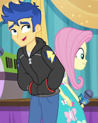 Size: 787x987 | Tagged: safe, screencap, flash sentry, fluttershy, best in show: the pre-show, better together, equestria girls, clothes, cropped, female, hands in pockets, hoodie, male, microphone, pants, smiling