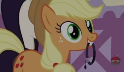 Size: 1136x662 | Tagged: safe, screencap, applejack, earth pony, pony, honest apple, collar, female, mare, mouth hold, solo