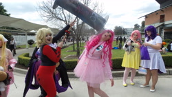 Size: 4608x2592 | Tagged: safe, artist:jarrahwhite, fluttershy, pinkie pie, rarity, human, clothes, cosplay, costume, cuckolding in the description, hammer, harley quinn, irl, irl human, photo