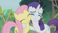 Size: 1600x900 | Tagged: safe, screencap, fluttershy, rarity, pegasus, pony, unicorn, fake it 'til you make it, female, hug, mare