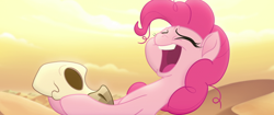 Size: 1920x804 | Tagged: safe, screencap, pinkie pie, earth pony, pony, my little pony: the movie, bone dry desert, dead, desert, desert sun madness, female, insanity, laughing, messy mane, skull, solo