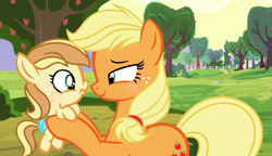 Size: 2277x1313 | Tagged: safe, artist:velveagicsentryyt, applejack, oc, oc:apple heart, earth pony, pony, baby, baby pony, female, filly, foal, holding a pony, mare, mother and child, mother and daughter, offspring, parent and child, parent:applejack, parent:caramel, parents:carajack