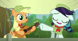 Size: 554x297 | Tagged: safe, applejack, coloratura, earth pony, pony, the mane attraction, clothes, clothes hanger, eyes closed, faic, female, filly, guitar, hat, musical instrument, singing