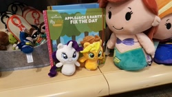 Size: 1248x702 | Tagged: safe, applejack, rarity, pony, applejack & rarity fix the day, book, female, hallmark, irl, itty biitys, itty bittys storybooks, merchandise, photo, plushie, shipping fuel