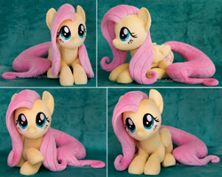 Size: 1826x1458 | Tagged: safe, artist:buttercupbabyppg, fluttershy, pegasus, pony, cute, daaaaaaaaaaaw, female, folded wings, happy, hnnng, irl, looking up, lying, mare, photo, plushie, shyabetes, smiling, solo, weapons-grade cute