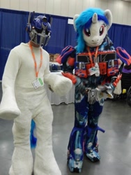 Size: 720x960 | Tagged: safe, dj pon-3, vinyl scratch, 2015, bronycon, clothes, cosplay, fursuit, head swap, irl, optimus prime, photo, transformers, wat