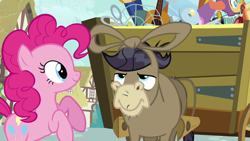 Size: 1280x720 | Tagged: safe, screencap, cranky doodle donkey, pinkie pie, donkey, earth pony, pony, a friend in deed, bowtie, cart, duo, female, male, mare, ponyville, rearing