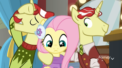 Size: 1920x1080 | Tagged: safe, screencap, flam, flim, fluttershy, pegasus, pony, unicorn, best gift ever, christmas sweater, clothes, cute, discovery family logo, female, flim flam brothers, hug, male, mare, melodramatic, necktie, scarf, shirt, shyabetes, stallion, sweater, trio, vest