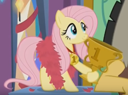 Size: 684x512 | Tagged: safe, screencap, discord, fluttershy, pegasus, pony, best gift ever, cropped, cute, feather boa, female, mare, medal, shyabetes, smiling, solo focus, trophy