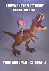 Size: 1833x2683 | Tagged: safe, artist:edhelistar, derpibooru exclusive, fluttershy, dinosaur, tyrannosaurus rex, equestria girls, badass, crossover, doll, equestria girls minis, fall formal outfits, flutterbadass, humans riding dinosaurs, image macro, irl, jurassic park, jurassic world, knee-high boots, meme, photo, ponied up, rexy, riding, roar, text, toy, your argument is invalid