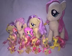 Size: 2283x1750 | Tagged: safe, artist:edhelistar, derpibooru exclusive, fluttershy, pony, equestria girls, beanie (plushie), beanie babies, blind bag, blind bag fluttershy, blind bag pony, brushable, doll, equestria girls minis, fall formal outfits, folded wings, glitter, human ponidox, irl, keychain pony, multeity, photo, plushie, rainbow power, self paradox, self ponidox, so much flutter, toy, ty beanie baby, wings