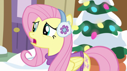 Size: 1280x720 | Tagged: safe, screencap, fluttershy, pegasus, pony, best gift ever, clothes, earmuffs, female, mare, open mouth, snow, solo, sweater