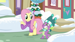 Size: 1280x720 | Tagged: safe, screencap, fluttershy, spike, dragon, pegasus, pony, best gift ever, clothes, duo, earmuffs, female, hat, male, mare, scarf, snow, sweater, winter