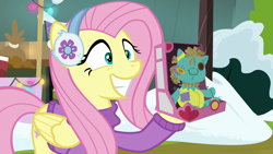 Size: 1280x720 | Tagged: safe, screencap, fluttershy, pegasus, pony, best gift ever, holly the hearths warmer doll