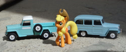 Size: 2463x1017 | Tagged: safe, artist:dingopatagonico, applejack, pony, car, irl, jeep, photo, solo, toy