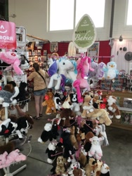 Size: 3024x4032 | Tagged: safe, photographer:henbasket, pinkie pie, rarity, bald eagle, human, lamb, sheep, irl, irl human, nature babies, new york, new york state fair, photo, plushie, toy, united states