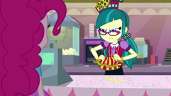 Size: 1920x1080 | Tagged: safe, screencap, juniper montage, pinkie pie, equestria girls, mirror magic, spoiler:eqg specials, apron, baubles, bracelet, cash register, cinema, clothes, female, food, frown, glasses, hair tie, hat, jewelry, pigtails, poofy shoulders, popcorn, scowl, shirt, skirt, soda machine, standing, twintails, uniform, vest