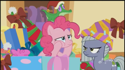 Size: 1280x720 | Tagged: safe, screencap, limestone pie, pinkie pie, alligator, earth pony, pony, best gift ever, christmas, decoration, discovery family logo, female, hat, holiday, limestone is not amused, male, mare, santa hat, sisters, unamused