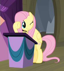 Size: 803x892 | Tagged: safe, screencap, fluttershy, pegasus, pony, horse play, bipedal, cropped, cute, female, lectern, mare, one eye closed, podium, raised hoof, shyabetes, smiling, wink