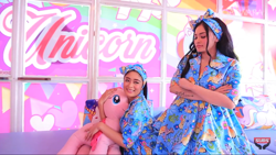 Size: 1920x1080 | Tagged: safe, pinkie pie, human, pony, unicorn, colorful, indonesia, irl, irl human, music video, photo, plushie