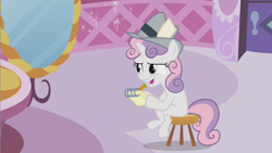 Size: 853x480 | Tagged: safe, screencap, sweetie belle, pony, unicorn, ponyville confidential, female, filly, foal, hat, hoof hold, mirror, mouth hold, notepad, pencil, sitting, solo, stool