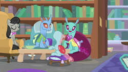 Size: 1280x720 | Tagged: safe, screencap, carapace (character), ocellus, octavia melody, spiracle, changedling, changeling, earth pony, pony, a horse shoe-in, animation error, book, bookshelf, bowtie, eyes closed, female, library, mare, sitting