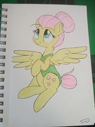 Size: 776x1040 | Tagged: safe, artist:taurson, fluttershy, pegasus, pony, alternate hairstyle, clothes, cute, female, hair bun, looking up, mare, one-piece swimsuit, raised hoof, shyabetes, sitting, solo, spread wings, swimsuit, three quarter view, traditional art, wings