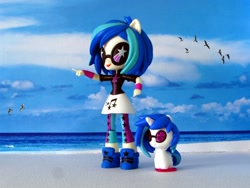 Size: 1600x1200 | Tagged: safe, artist:whatthehell!?, dj pon-3, vinyl scratch, pony, unicorn, equestria girls, beach, clothes, cutie mark crew, doll, equestria girls minis, glasses, gulls, human ponidox, irl, leggings, merchandise, ocean, photo, self ponidox, shoes, skirt, sneakers, sunglasses, toy