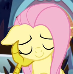 Size: 726x740 | Tagged: safe, screencap, discord, fluttershy, pegasus, pony, the beginning of the end, cropped, eyes closed, floppy ears, offscreen character, shipping fuel, solo focus