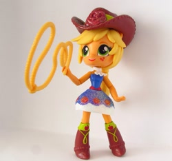 Size: 1263x1183 | Tagged: safe, artist:whatthehell!?, applejack, equestria girls, boots, clothes, cowboy, cowboy boots, cowboy hat, doll, dress, equestria girls minis, flower, hat, rope, rose, skirt, stetson, toy