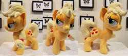 Size: 1024x451 | Tagged: safe, artist:plushypuppy, applejack, earth pony, pony, female, irl, lidded eyes, mare, missing accessory, photo, plushie, solo, standing