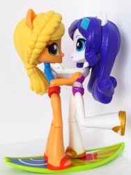 Size: 1410x1880 | Tagged: safe, artist:whatthehell!?, applejack, rarity, equestria girls, bikini, clothes, cute, doll, equestria girls minis, female, irl, lesbian, photo, ponied up, rarijack, sandals, shipping, surfboard, swimsuit, toy