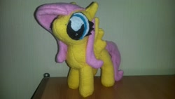 Size: 3264x1836 | Tagged: safe, artist:jbond, fluttershy, pony, handmade, irl, meme, photo, photography, plushie, special eyes, what has science done