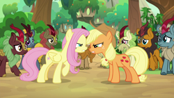 Size: 1280x720 | Tagged: safe, screencap, applejack, cinder glow, fern flare, fluttershy, maple brown, pumpkin smoke, sparkling brook, summer flare, earth pony, kirin, pegasus, pony, sounds of silence, applejack's hat, background kirin, cowboy hat, fight, hat, stetson