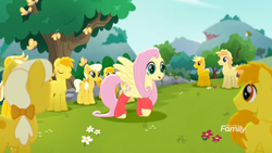 Size: 1366x768 | Tagged: safe, screencap, fluttershy, butterfly, earth pony, pegasus, pony, rainbow roadtrip, background pony, bow, clones, clothes, crowd, discovery family logo, dot cutie mark, female, flower, hair bow, hill, leg warmers, male, mare, raised hoof, stallion, tree, unnamed pony, yellow, yellow pony