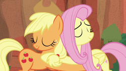 Size: 1280x720 | Tagged: safe, screencap, applejack, fluttershy, earth pony, pegasus, pony, sounds of silence, hug